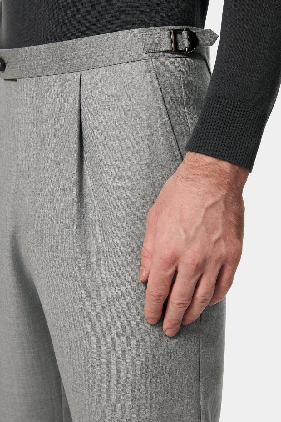 Grey pleated trousers with a side-adjuster waistband
