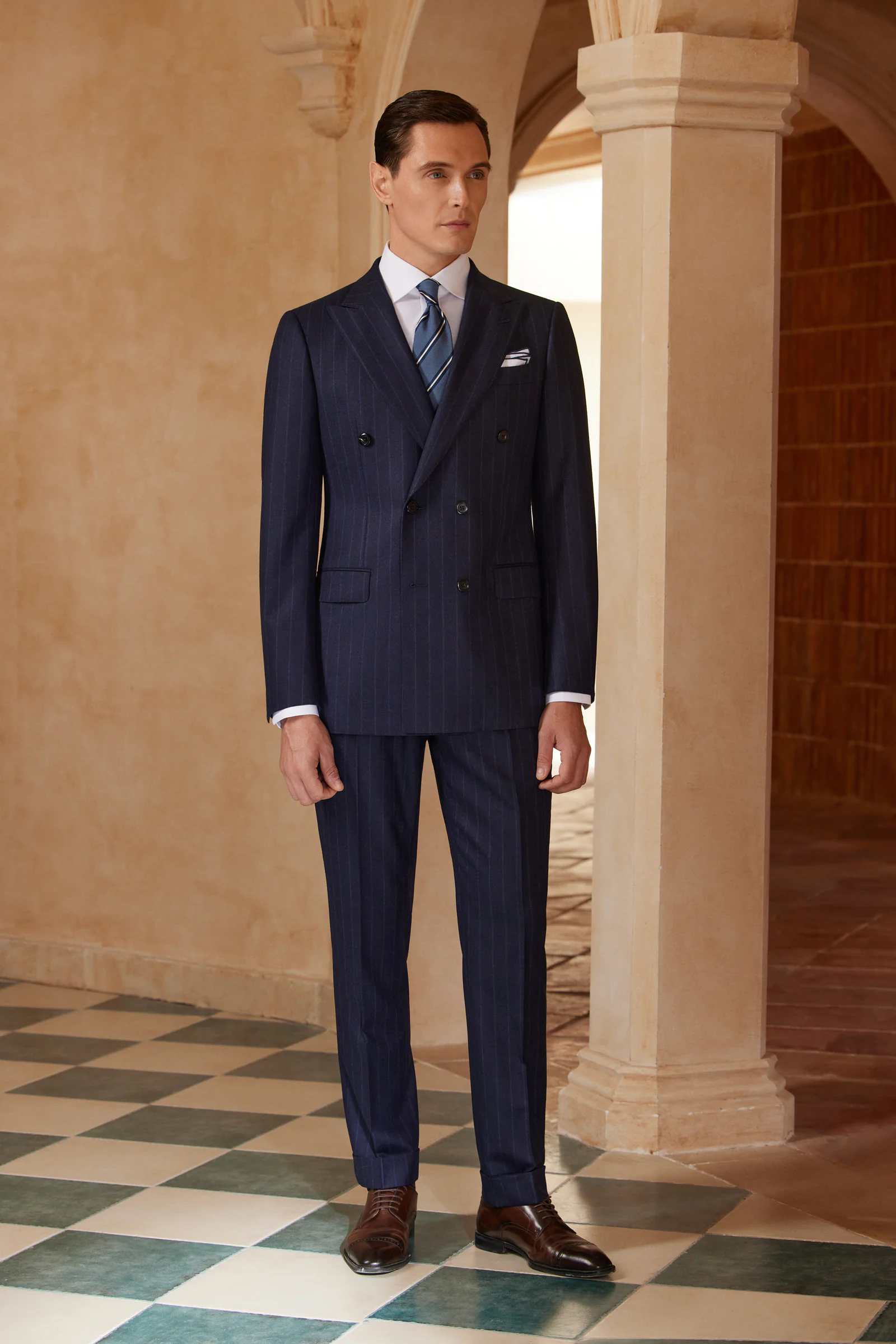 Dark bespoke business suit in a tailoring studio